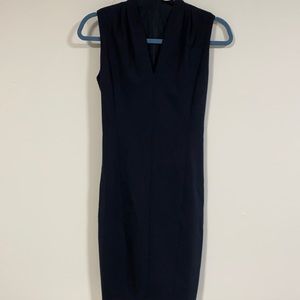 Women’s Tahari black dress size 4. Open v neck